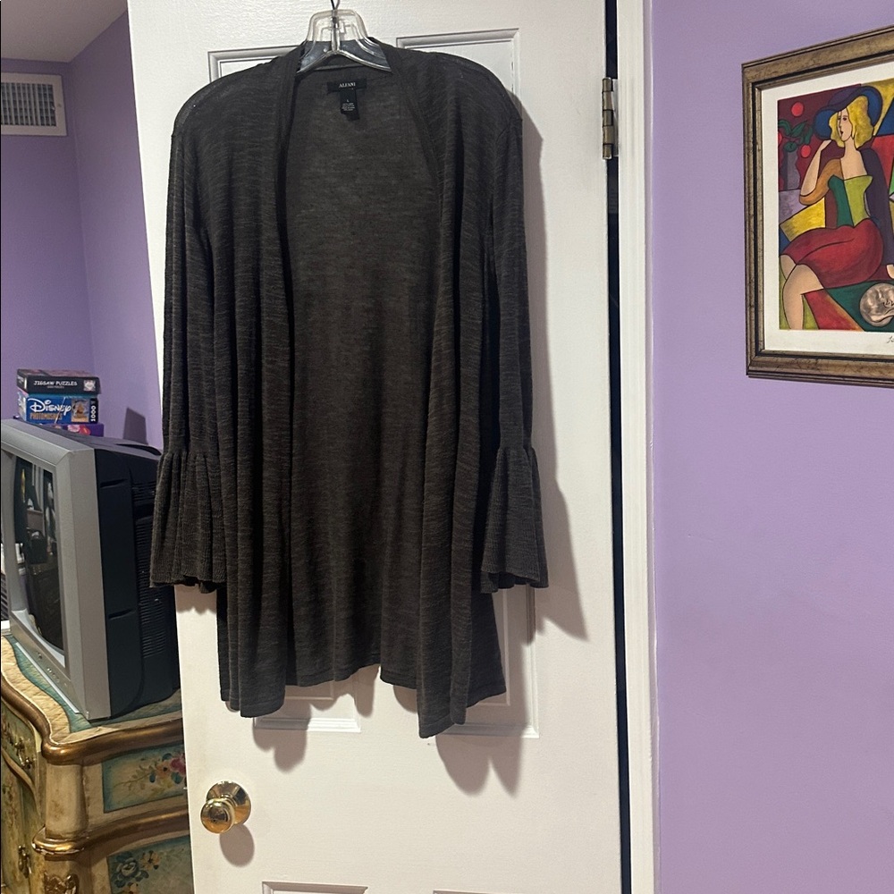 Alfani sweater, lightweight for spring or summer.  Ruffle sleeve at bottom